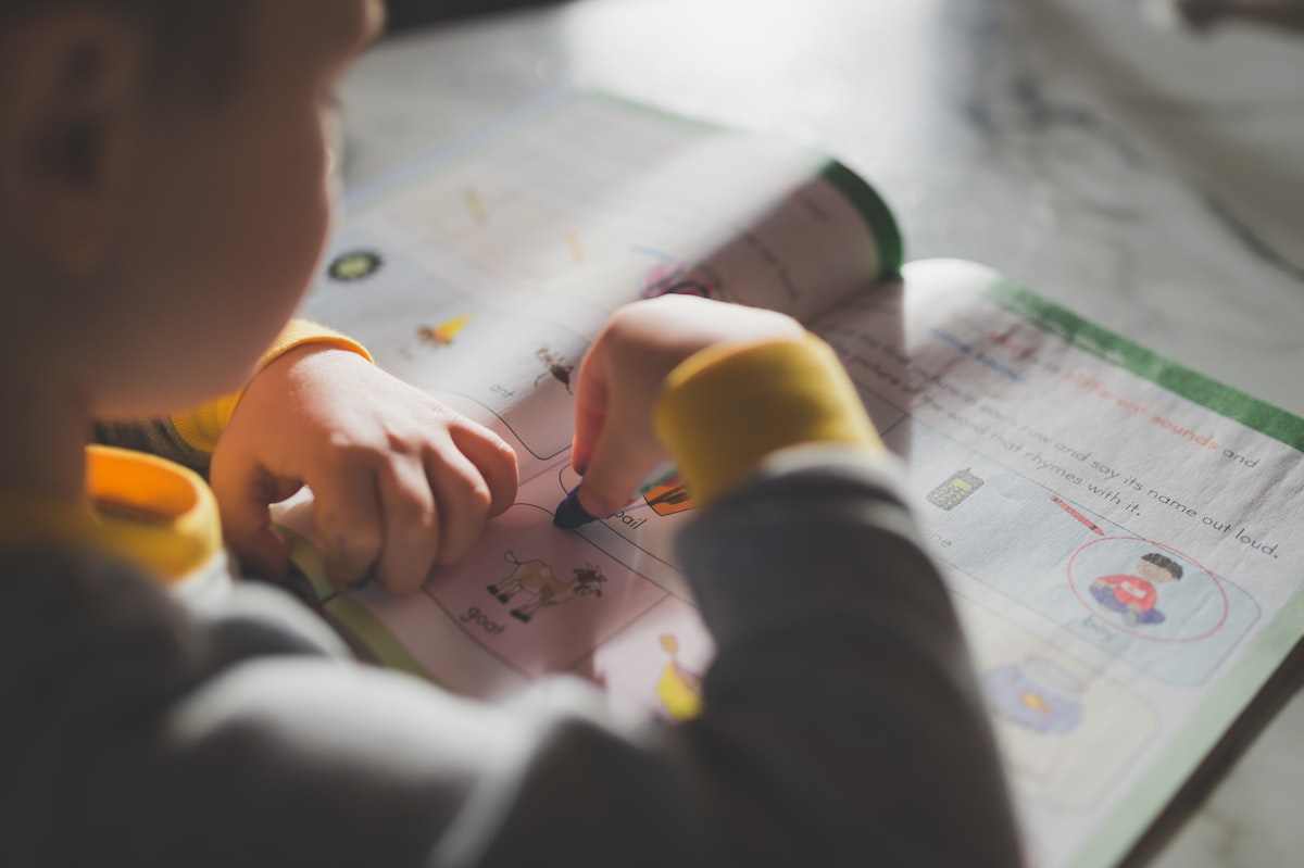 A young child engaged in focused play.